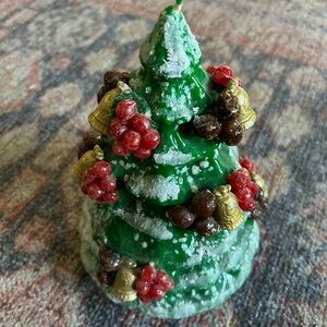 Festive Green Christmas Tree Candle with Red Berry and Gold Bell Accents